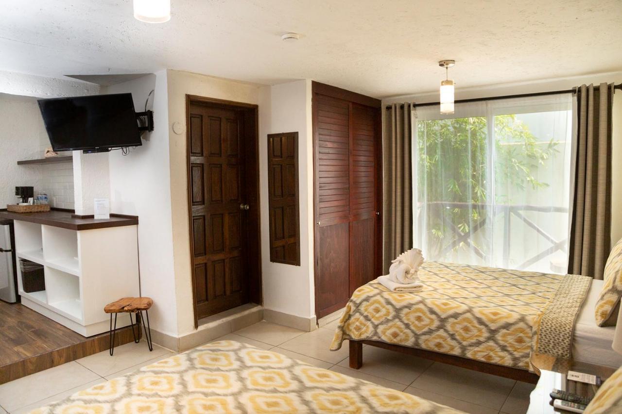 Hotel Amar Inn Puerto Morelos Exterior photo